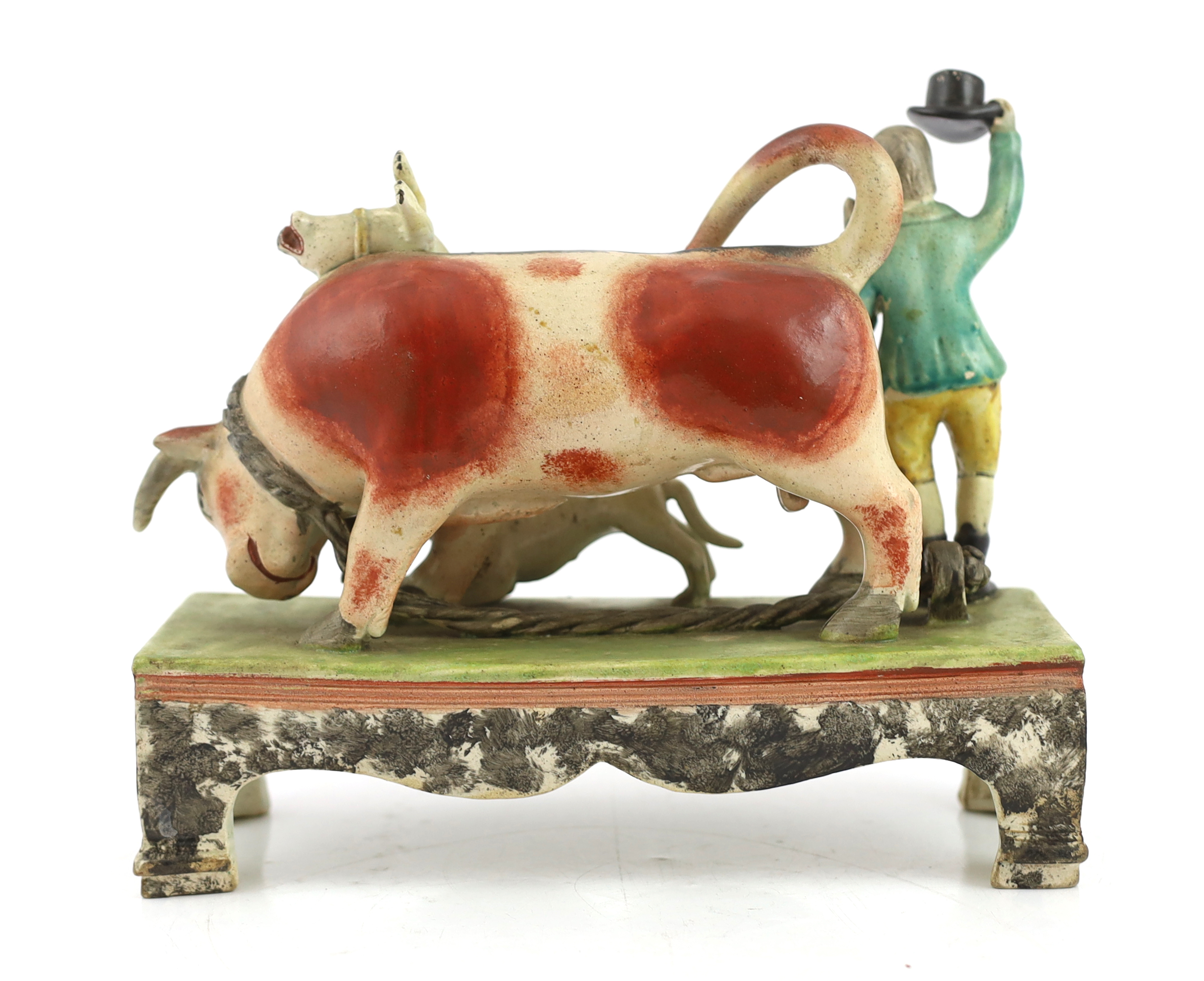 A Staffordshire pearlware bull baiting group, of Obadiah Sherratt type, c.1830, Some restoration